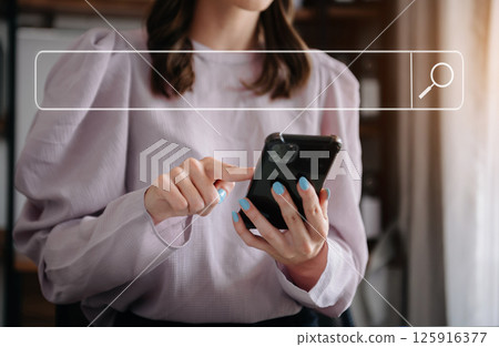 Searching Browsing Internet Data Information Networking Concept with blank search bar.woman working with mobile phone and laptop computer VR icon 125916377