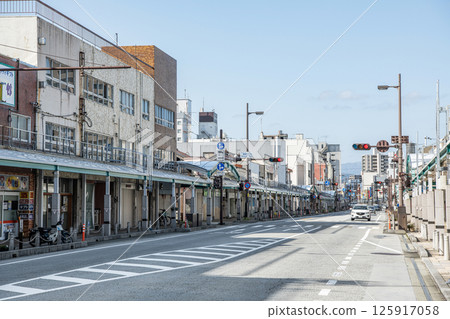 A rural shopping street with few people (image) A rural shopping street with few people (image) 125917058