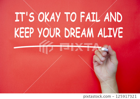 It is okay to fail and keep your dream alive text written on red cover background. Inspirational and motivational concept. 125917321