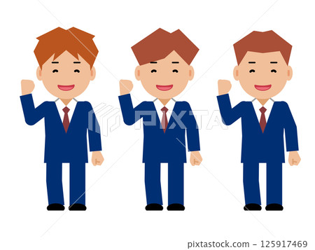 A smiling young man in a navy blue suit doing a fist pump 125917469