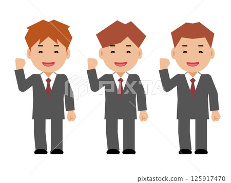 A smiling young man in a gray suit doing a fist pump 125917470