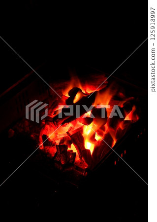 Red-hot charcoal fire 125918997