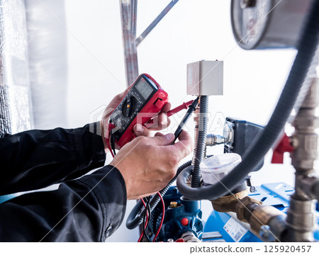 Technician checking water system nodes.Modern Industrial background 125920457