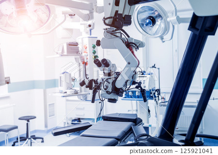 Modern microscope for operations in surgery room at the hospital. 125921041