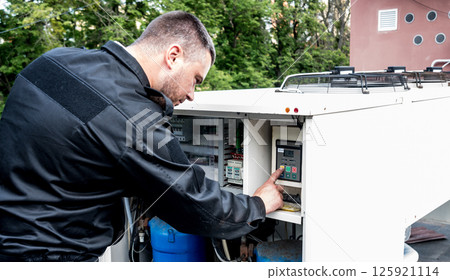 Ventilation cleaning. Specialist at work. Repair ventilation system  125921114