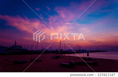 Beautiful view of marina and harbor with yachts and motorboats.  125921187