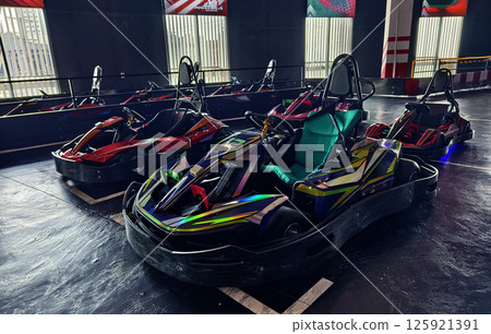 New electric go karts in the modern indoor racing track 125921391