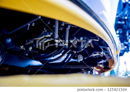 Modern agricultural machinery and equipment. Yellow agricultural harvester. Modern agricultural machinery and equipment. Yellow agricultural harvester. 125921504