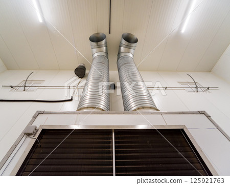 Empty industrial freezer warehouse for vegetable storage. Empty industrial freezer warehouse for vegetable storage. 125921763