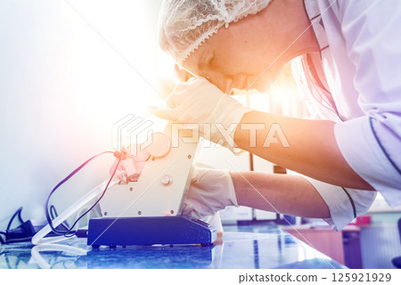 Natural oil quality control. In the industrial laboratory. Natural oil quality control. In the industrial laboratory. 125921929