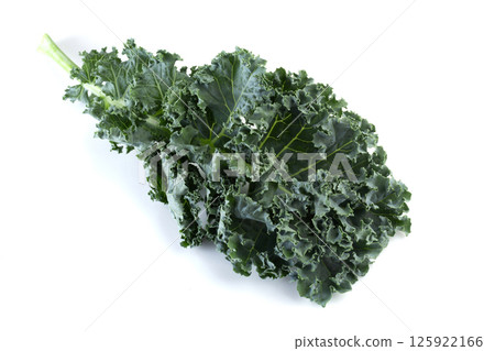 Fresh green leaves of Kale. Green vegetable leaves isolated on a white background. Fresh green leaves of Kale. Green vegetable leaves isolated on a white background. 125922166