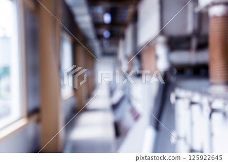 Interior of modern natural oil factory. The piping, pumps and motors Interior of modern natural oil factory. The piping, pumps and motors 125922645