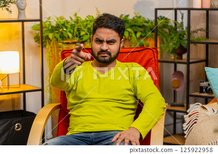 Strict unhappy man pointing finger to camera, looking angry, making choice, accusing for mistake 125922958