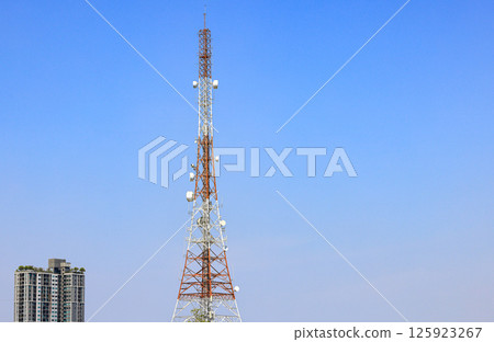 Detail of Transmitting and radio antenna Tower, steel Structure installed with dual polarization microwave antenna or Hyperbolic Antenna. Frame for modern metal building with beautiful sky. 125923267