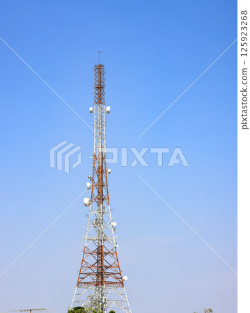 Detail of Transmitting and radio antenna Tower, steel Structure installed with dual polarization microwave antenna or Hyperbolic Antenna. Frame for modern metal building with beautiful sky. 125923268