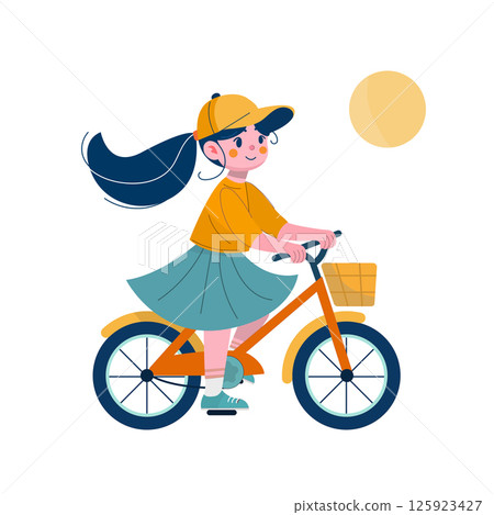 Girl woman child rides a bicycle . Cycling. Girl woman child rides a bicycle . Cycling. 125923427