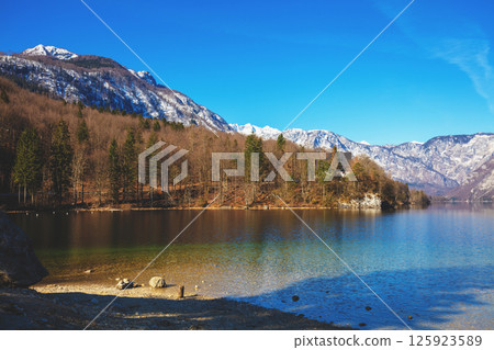Mountain lake with reflection. Lake Bohinj, Slovenia. 125923589