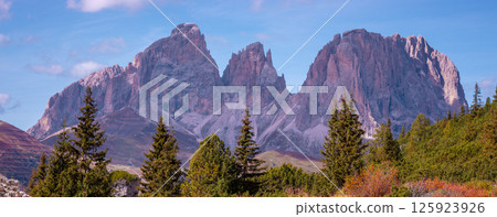Mountain landscape background. Rocks against the day sky. The Dolomites in South Tyrol, Italy. Horizontal banner Mountain landscape background. Rocks against the day sky. The Dolomites in South Tyrol, Italy. Horizontal banner 125923926
