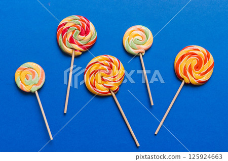 Set of colorful lollipops on colored background. Summer concept. Party Happy Birthday or Minimalist Concept 125924663