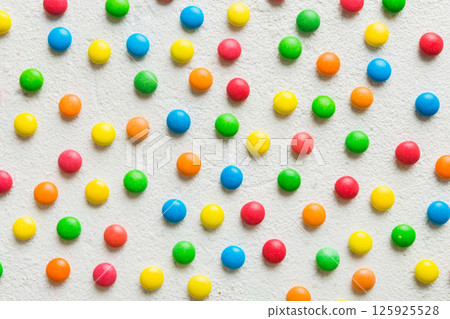 colorful candies as background top view. Seamless pattern with candy. Many sweet candies close-up colorful candies as background top view. Seamless pattern with candy. Many sweet candies close-up 125925528