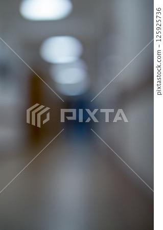 Vertical blurred, defocused abstract background Corridor of higher educational, state institution building beige calm light tones. A symbol of passage into unknown, uncertainty in future life path 125925736