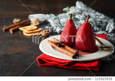 Tasty and delicious food concept - pear in wine 125925858