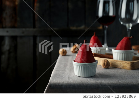 Tasty and delicious food concept - pear in wine Tasty and delicious food concept - pear in wine 125925869