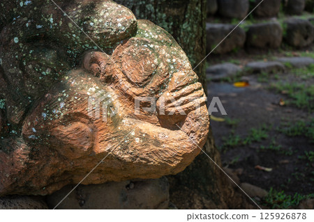 Stone tiki statue in Atuona, Hiva Oa, Marquesas Islands, French Polynesia Stone tiki statue in Atuona, Hiva Oa, Marquesas Islands, French Polynesia 125926878
