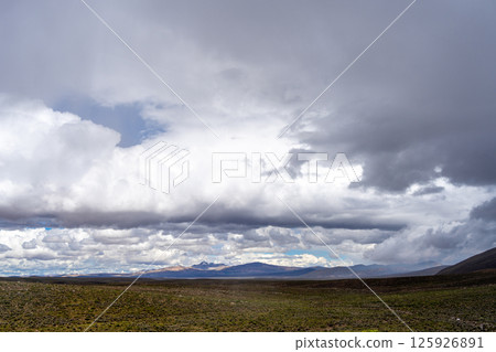 Vast valley and mountains landscape with dramatic sky, Peru 125926891