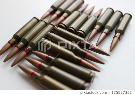 Angle View Of Real Bullets Caliber 5.45 Laid Out In Square Order Isolated On White 125927391