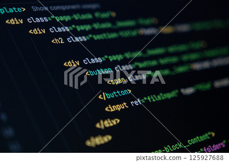 close-up of computer screen with colorful html code, focus on div and button elements, web development and frontend design 125927688