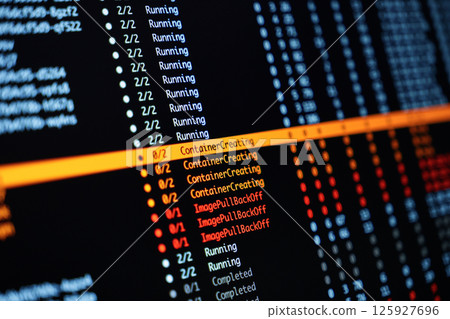 colorful terminal output showing kubernetes container statuses including running, creating, and error messages on dark screen background 125927696