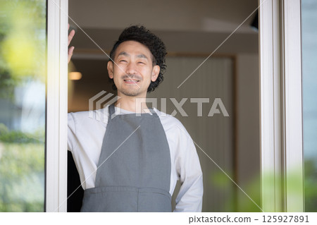 A bearded man looking out the window. Image of lifestyle, second life, semi-retirement 125927891