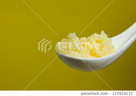 Ghee Butter In A Spoon Copy Space for Text 125928215