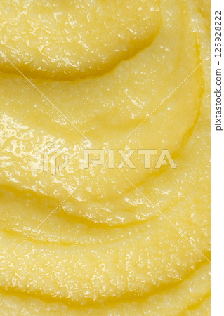 Shiny Golden Ghee Butter Texture Close Up Top View 125928222