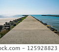 Walking along the jetty 125928823