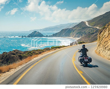 Scenic Coastal Road with Views of Waves and Cliffs 125928980