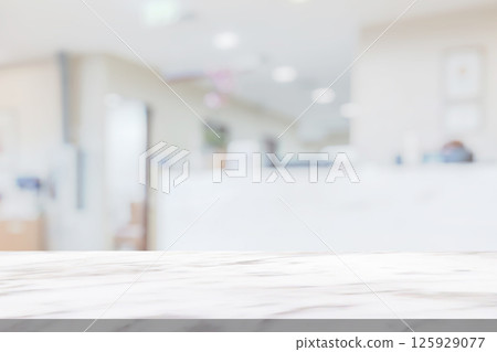 Marble table top with blur hospital clinic medical interior background Marble table top with blur hospital clinic medical interior background 125929077