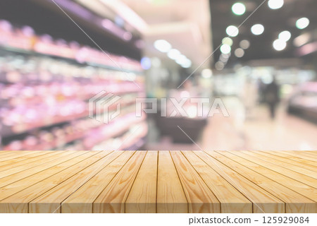 Empty wood table top with supermarket blurred background for product display 125929084