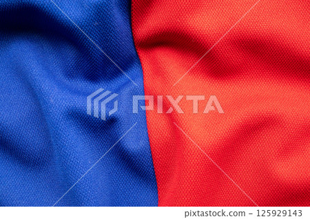 Blue and red sports clothing fabric football shirt jersey texture Blue and red sports clothing fabric football shirt jersey texture 125929143