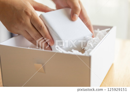 Eco friendly white paper wrap for product packaging parcel carton box Eco friendly white paper wrap for product packaging parcel carton box 125929151