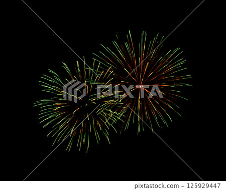 Red and green firework sparkling on black background for celebration and anniversary Red and green firework sparkling on black background for celebration and anniversary 125929447