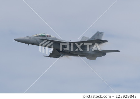 A US Navy F/A-18F Super Hornet performing a demonstration flight at the Iwakuni Air Base Air Show 125929842
