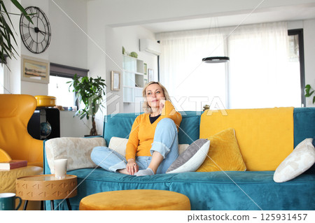 an adult woman working in home interior, lifestyle people concept an adult woman working in home interior, lifestyle people concept 125931457