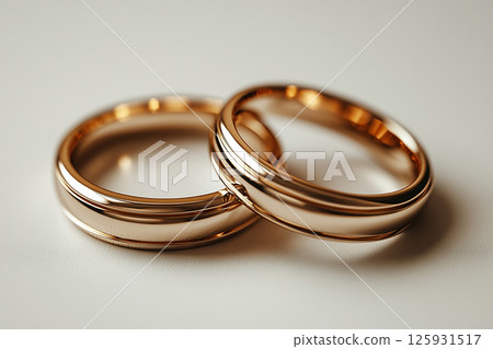 Pair of Wedding Rings on a white background. 125931517