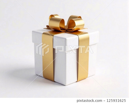 A gold and white gift box with a gold ribbon A gold and white gift box with a gold ribbon 125931625