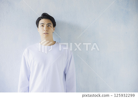 A man wearing a T-shirt A man wearing a T-shirt 125932299