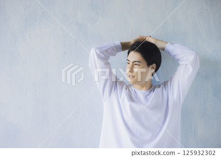 A man wearing a T-shirt A man wearing a T-shirt 125932302