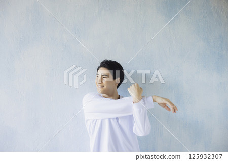 A man wearing a T-shirt A man wearing a T-shirt 125932307