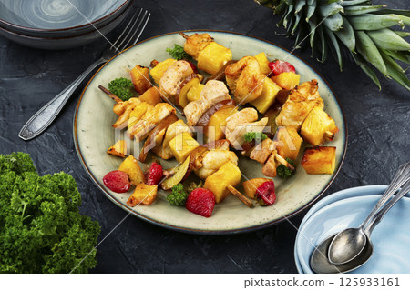 Chicken shashlik with pineapple. 125933161